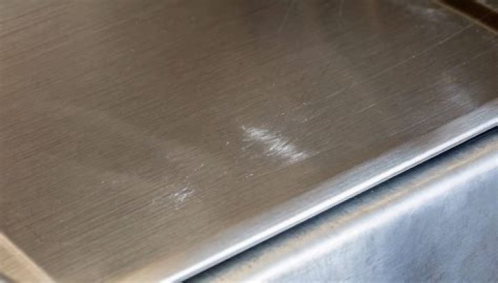 Does WD 40 remove scratches from stainless steel?