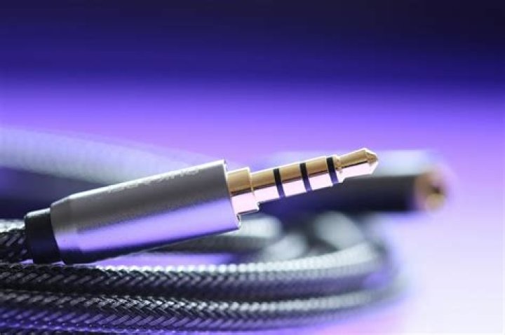 How can I play music on my phone without a headphone jack?