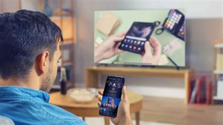 How do I mirror my iPhone to my smart TV?