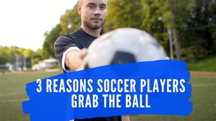 Why do soccer players grab the ball after scoring?